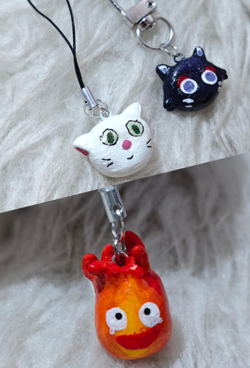 Scarameow (Genshin Impact), Lily (Kiki's Delivery Service), Calcifer (Howl's Moving Castle) Scarameow (Genshin Impact), Lily (Kiki's Delivery Service), Calcifer (Howl's Moving Castle)